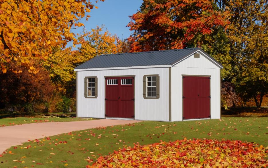 Compass Big Sky: barn white LP barn siding with jamestown red double doors, shale paint trim and charcoal roofing.