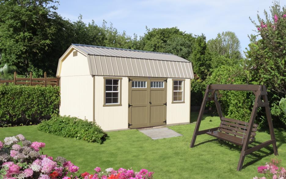 Compass High Barn: Navajo white siding with double doors, shale paint trim and clay roofing