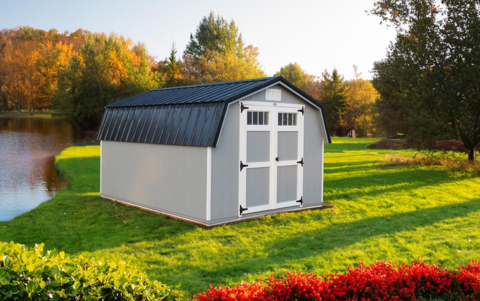 Compass Mini Barn: cape cod gray LP barn siding, double doors, barn white trim and black metal roofing