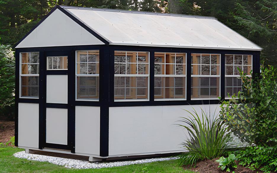 The Greenhouse: Barn white LP barn siding with black trim
