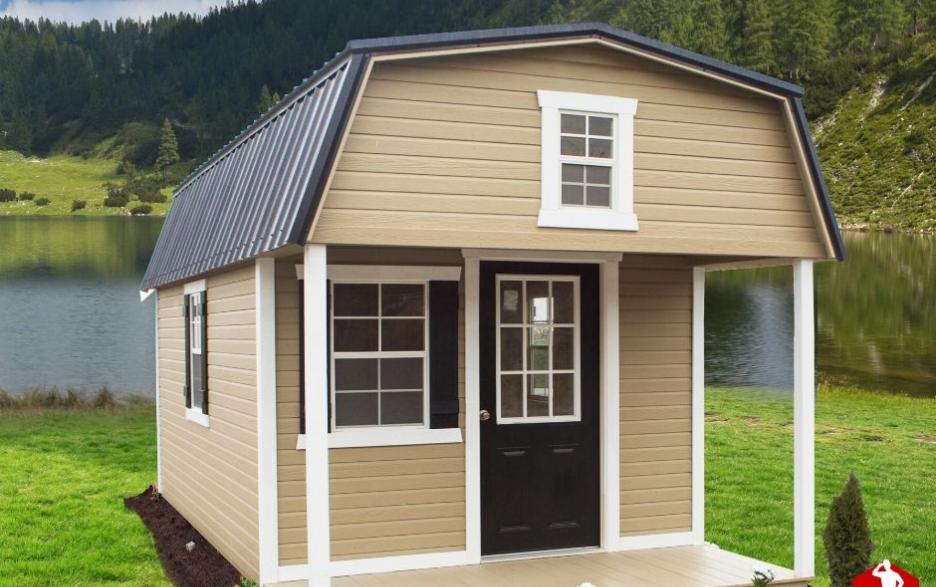 Tan Signature Lofted Cabin with white trim, a black door, and a black roof.