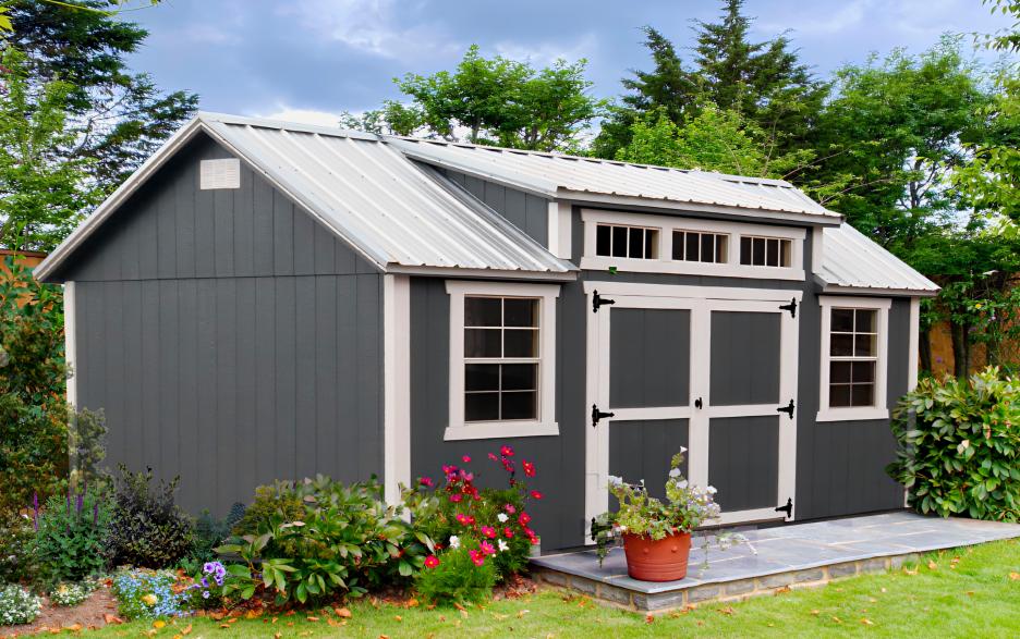 Signature Louisville: dark gray LP barn siding with dark gray double doors, barn white trim & galvalume roofing