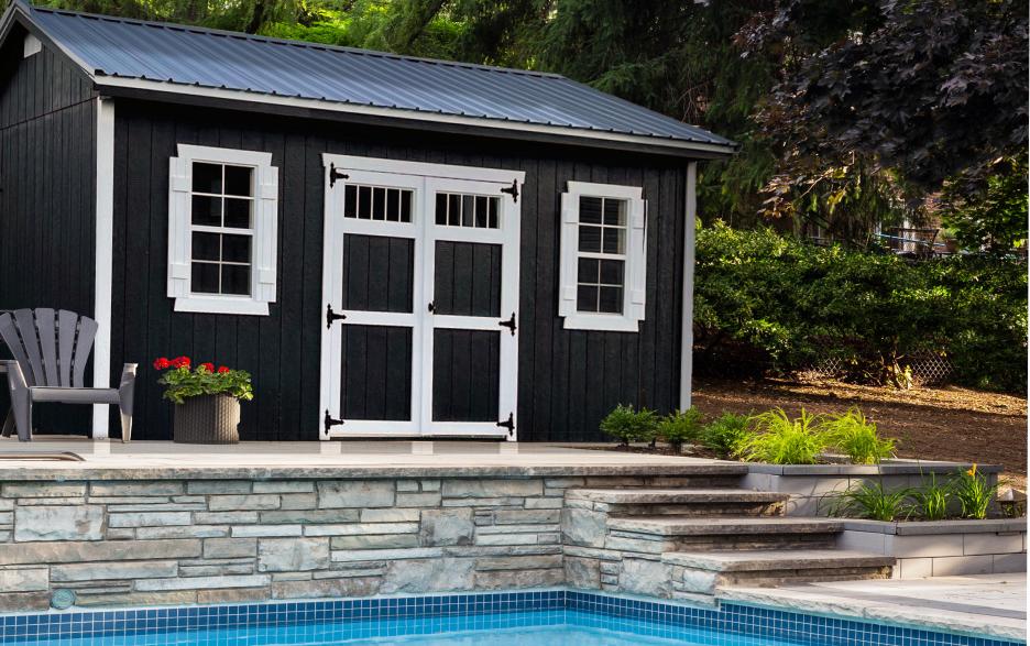 Signature Oakdale: black LP barn siding with black double doors, barn white trim & galvalume roofing