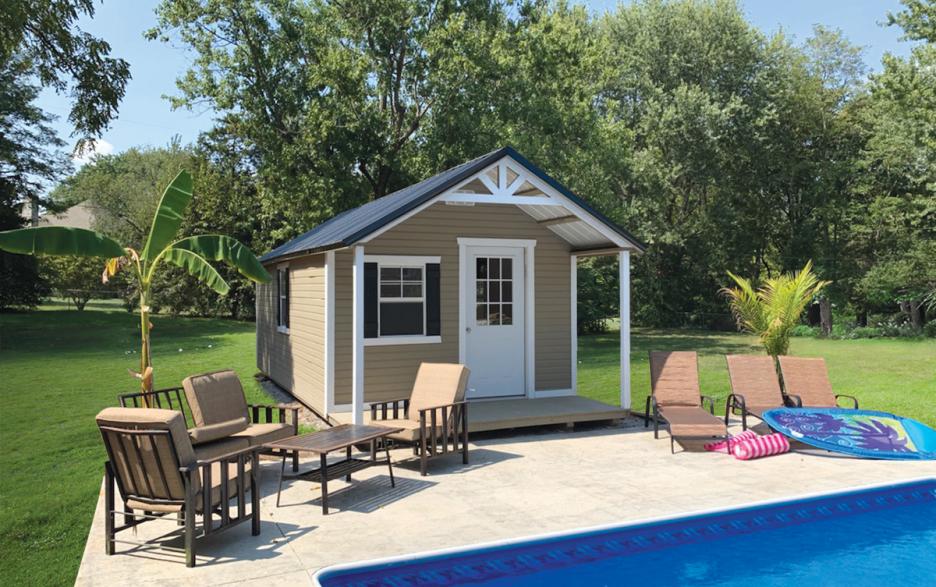 Signature Hunter Cabin: pequea tan LP dutchlap siding with white door, barn white trim and shiny black roofing